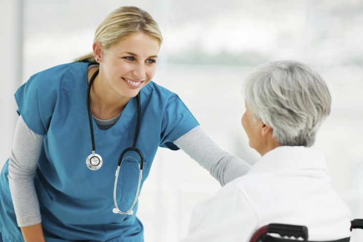 Young Doctor Speaking With an Elderly Patient